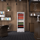 A swing glass door commercial merchandiser refrigerator with drinks and beverages on shelves in the restaurant scene