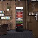 A swing glass door commercial merchandiser refrigerator with drinks and beverages on shelves in the restaurant scene
