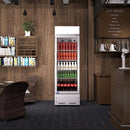 A swing glass door commercial merchandiser refrigerator with drinks and beverages on shelves in the restaurant scene