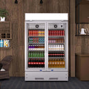 A two-section swing glass door commercial merchandiser refrigerator with drinks and beverages on shelves in the restaurant scene