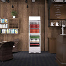 A swing glass door commercial merchandiser refrigerator with drinks and beverages on shelves in the restaurant scene