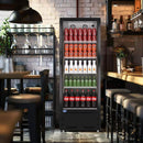 A swing glass door commercial merchandiser refrigerator with drinks and beverages on shelves in the restaurant scene
