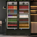 A two-section swing glass door commercial merchandiser refrigerator with drinks and beverages on shelves in the restaurant scene